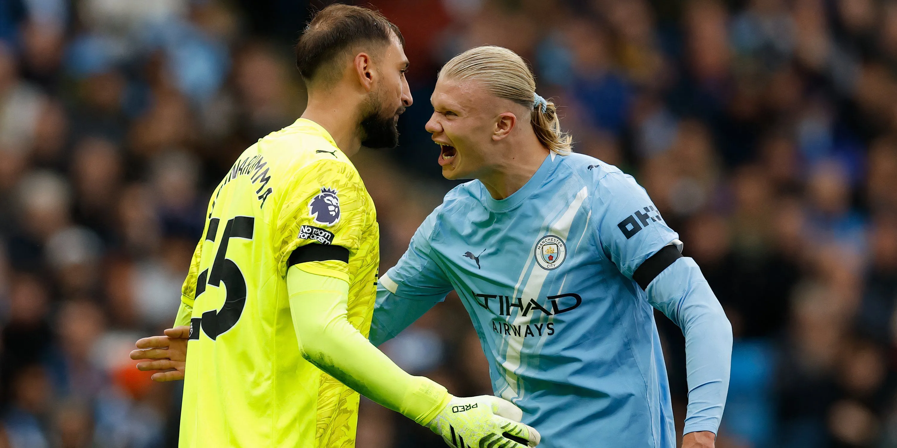 Thủ môn Gianluigi Donnarumma và tiền đạo Erling Haaland của Man City